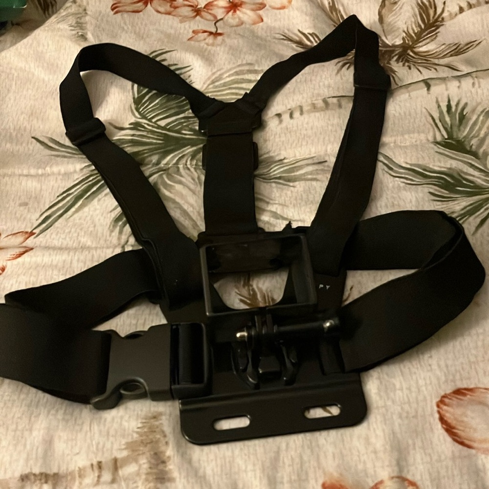 GoPro mount shoulder/waist harness. Brand new never used.